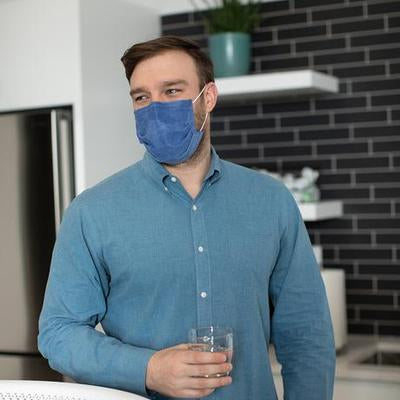 Man wearing Denim Blue Aries Barrier Face Covering